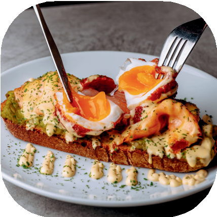 Poached egg with halloumi and smashed avocado at Nesso Leeds brunch