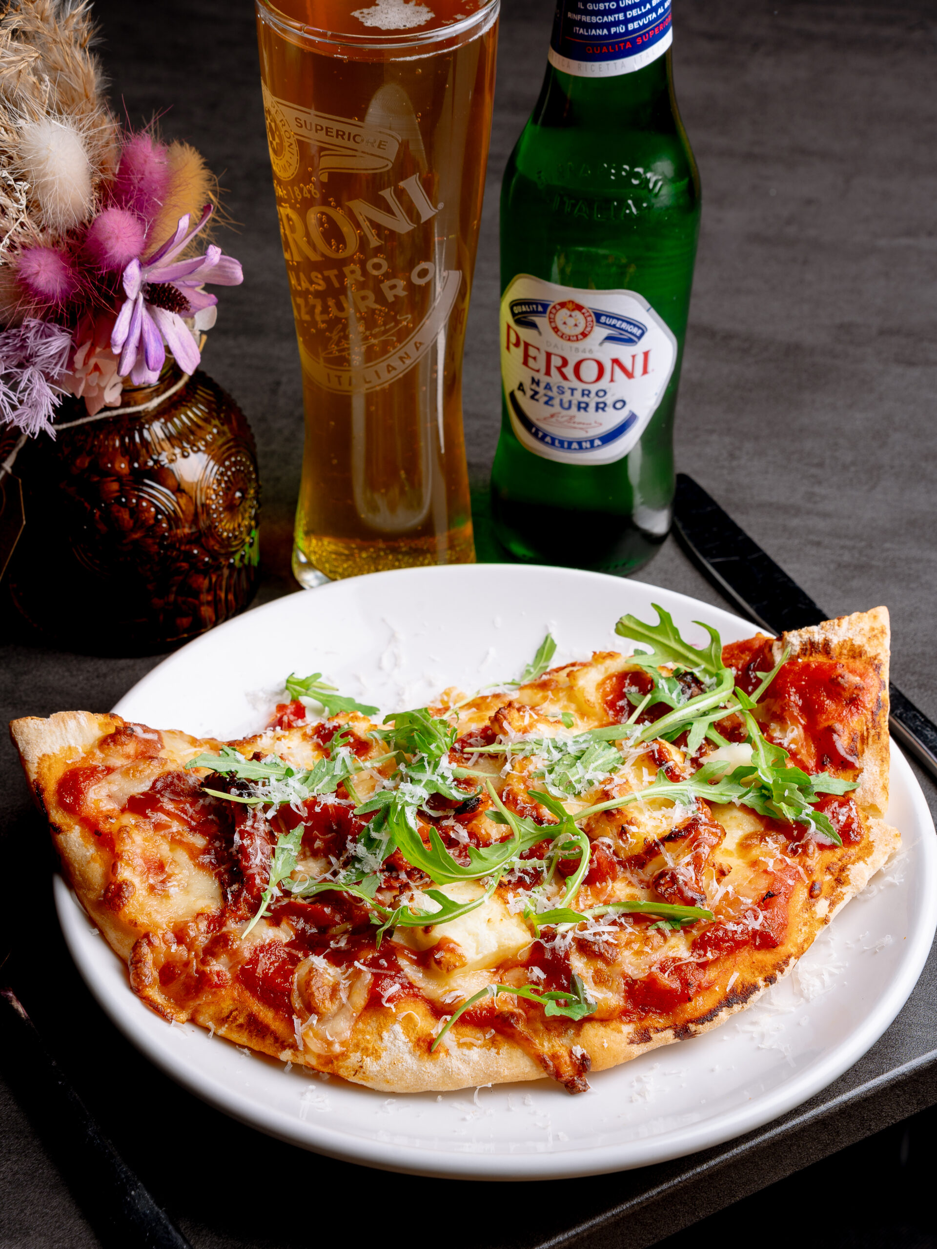 Spicy firecracker chicken pizza slice at Nesso Leeds Merrion Street